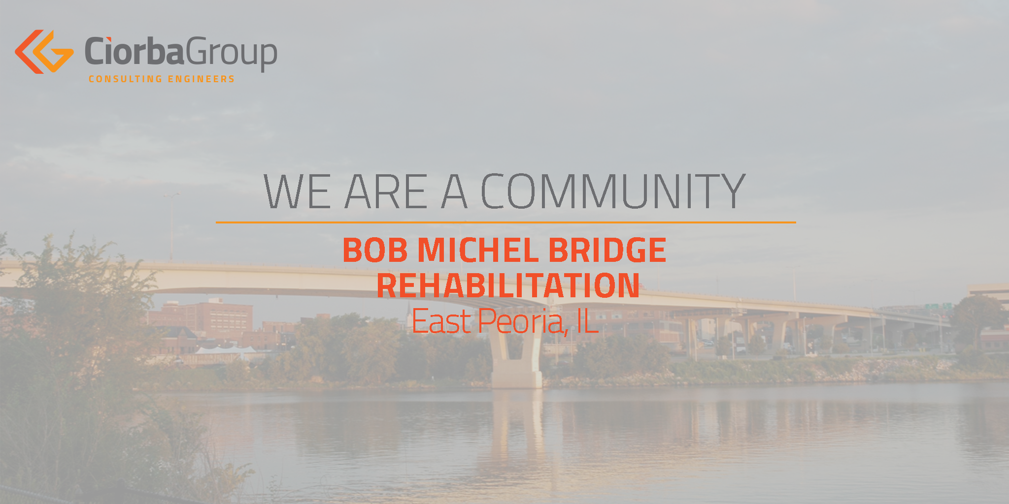 A bridge with the words we are a community in front of it.