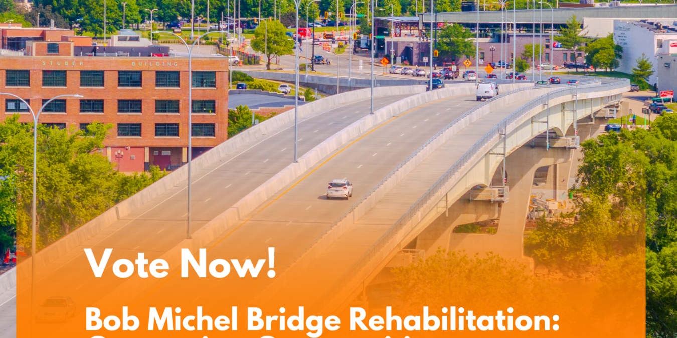 Elevated highway through city with orange banner