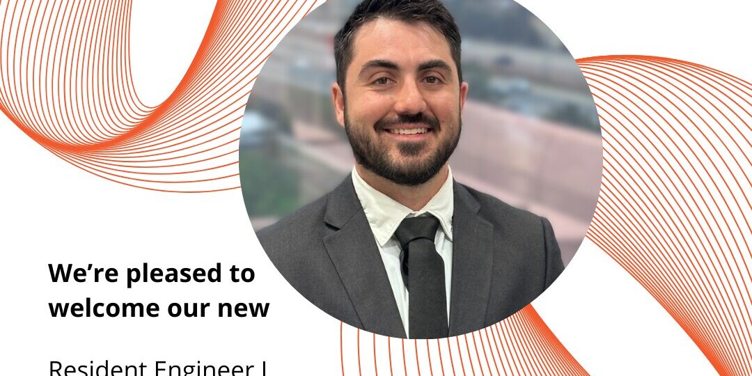 Professional headshot with orange company logo