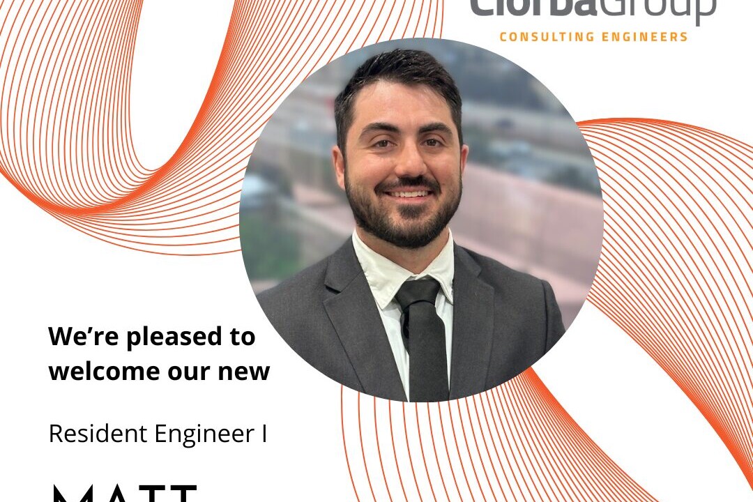 Professional headshot with orange company logo